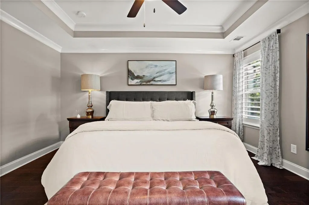 The tray ceiling ofofers additional height to the space