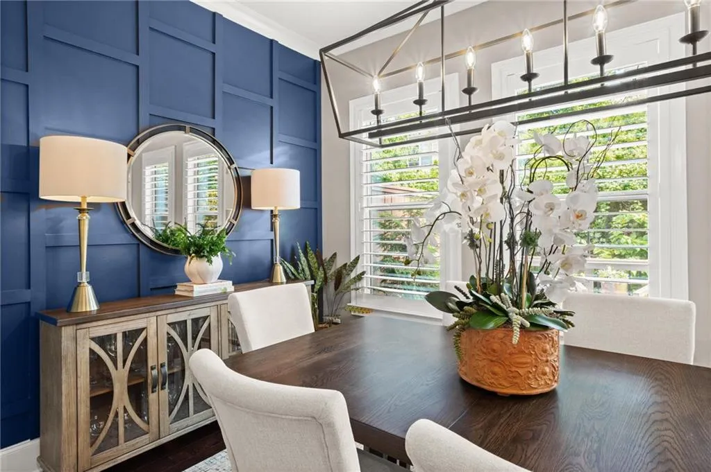 Upgrades shine in this dining room space while overlooking the private back patio
