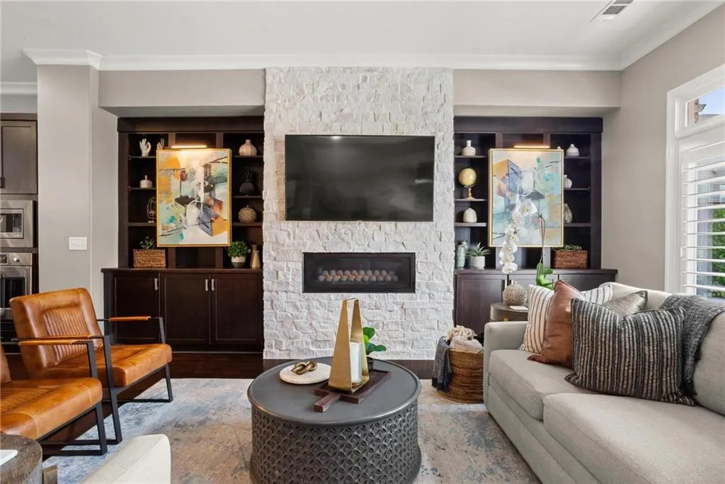 Stately living room welcomes you as soon as you arrive filled with upgrades