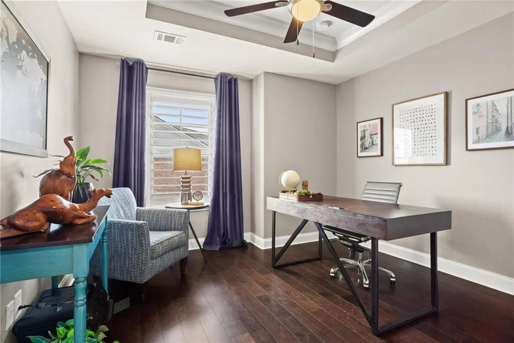 One of two secondary bedrooms upstairs each filled with natural light