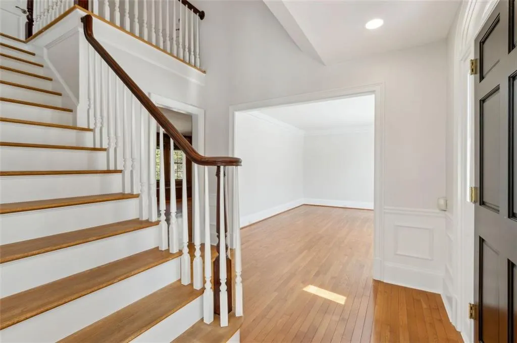 Entry foyer flanks Living room & Dining room