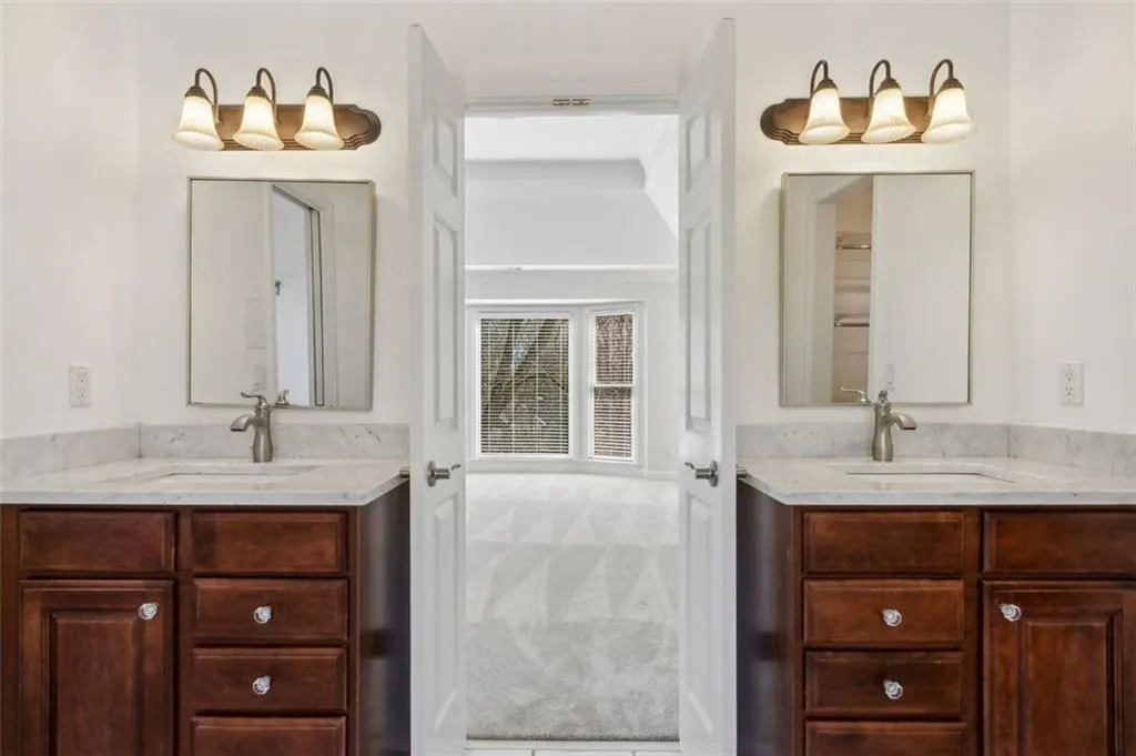 Dual vanities of carrara marble