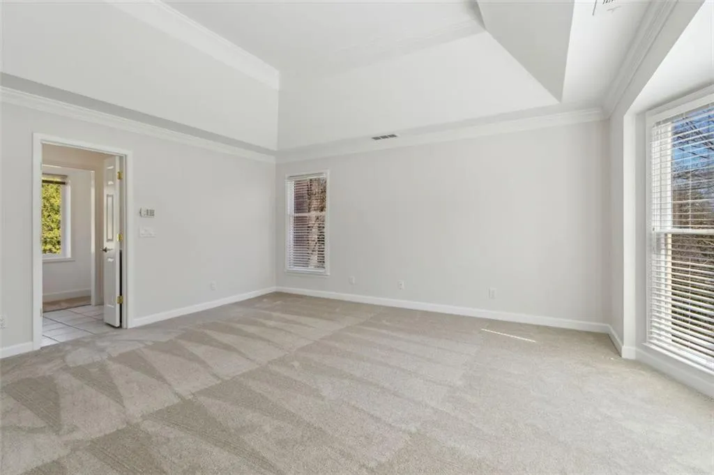 Trey ceiling and filled with natural light