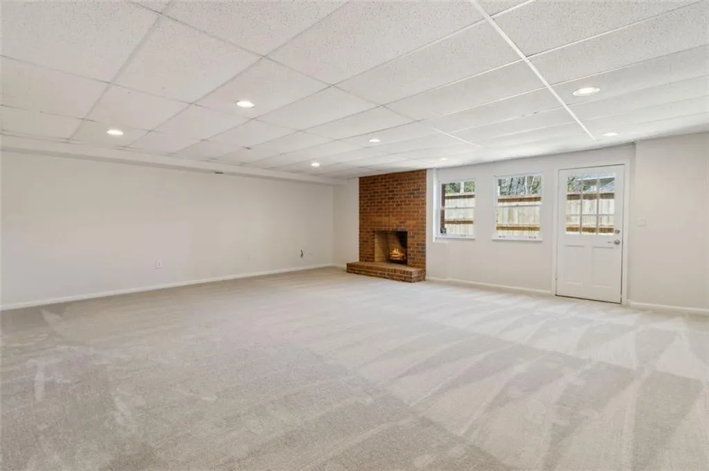 Freshly painted and carpeted basement ready for any your hobbies