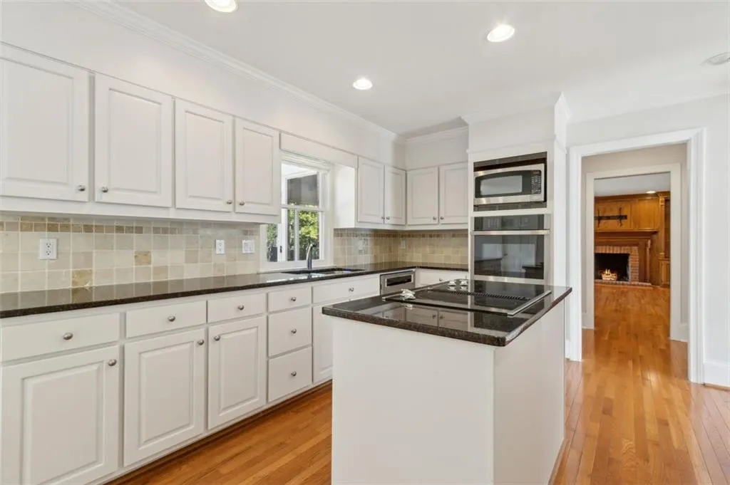 View of kitchen from convenient garage entry