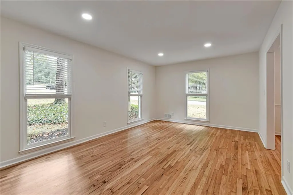 Spare room featuring light hardwood / wood-style flooring