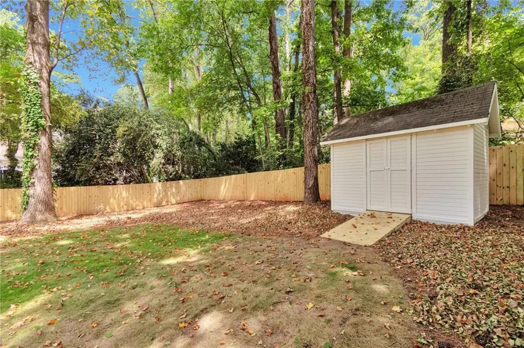 View of yard with a shed