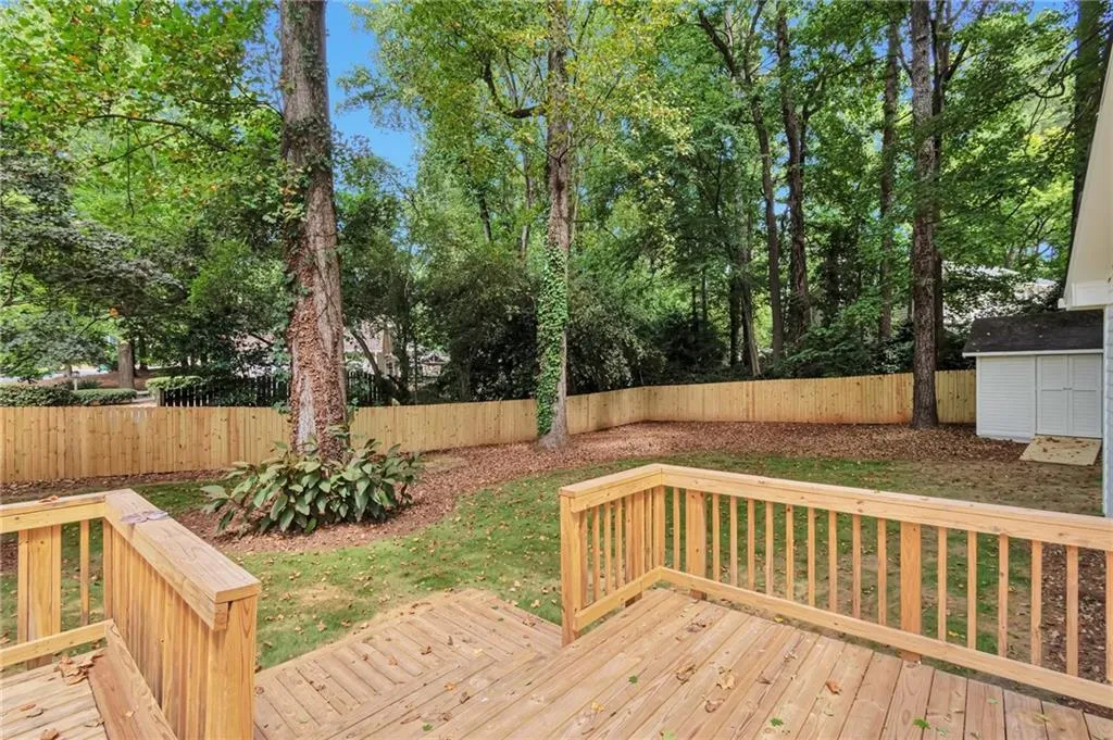 Deck with a storage unit