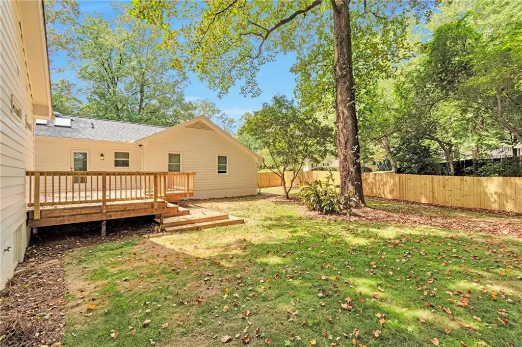 View of yard featuring a deck