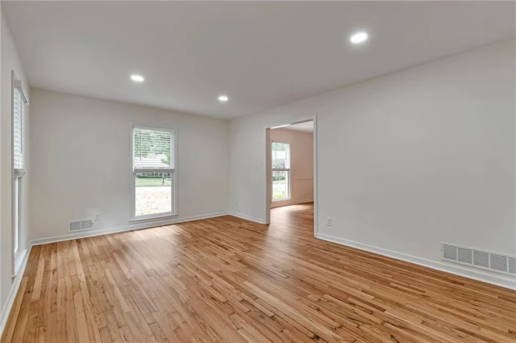 Empty room featuring light hardwood / wood-style floors
