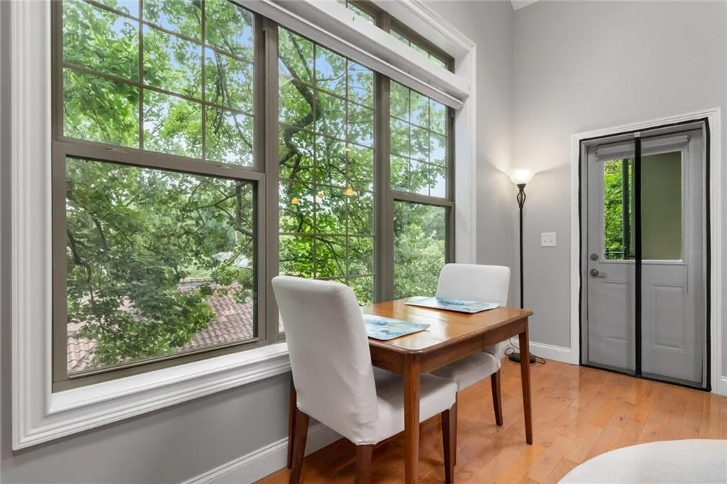 Dining room featuring light wood-style flooring and a desk