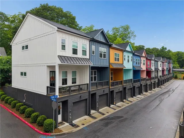 Modern townhome row featuring distinct architectural designs