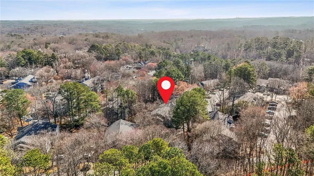 Drone / aerial view of a heavily wooded area