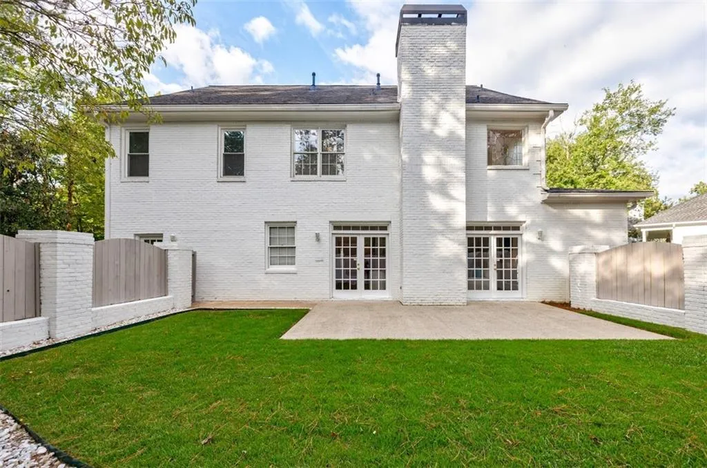 Walkout from family room to fabulous patio and fenced yard.
