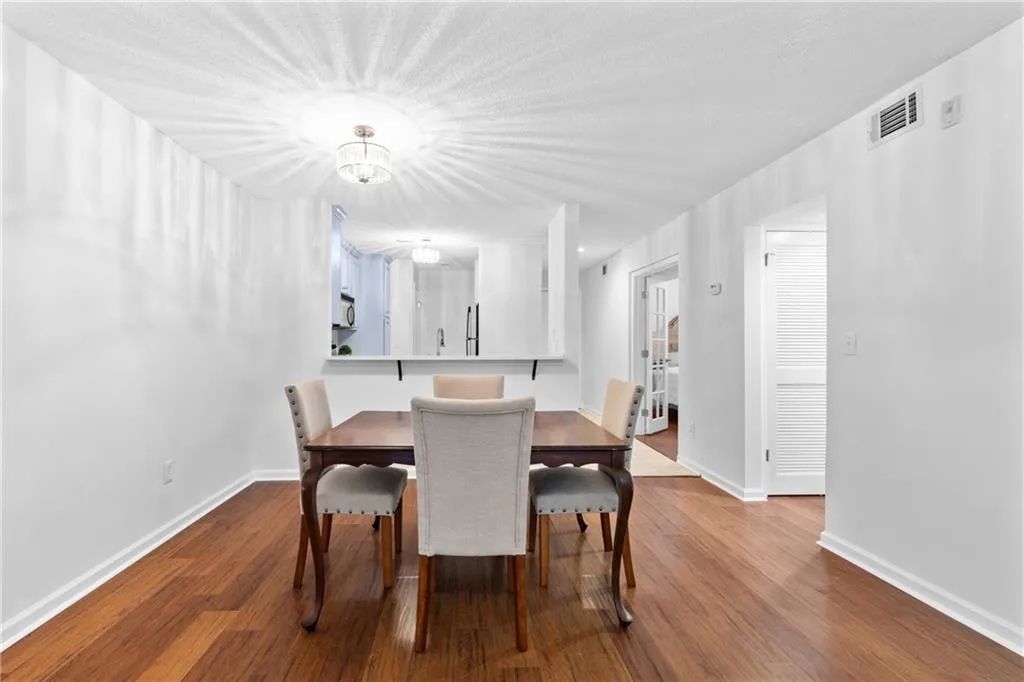 Open concept dining room with view to kitchen