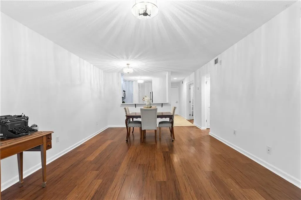 Dining room with beautiful wood-style flooring