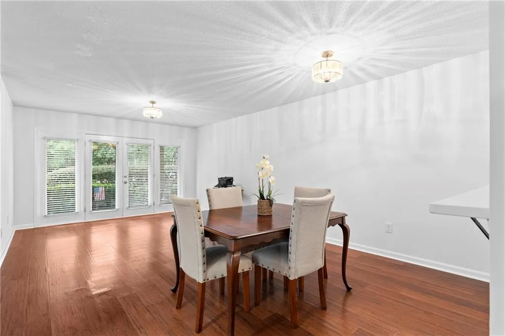 Dining area with view to the living room and back patio