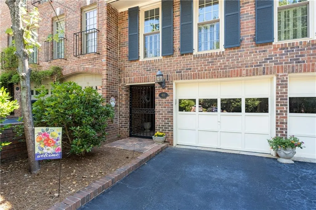 Entrance to property with a garage