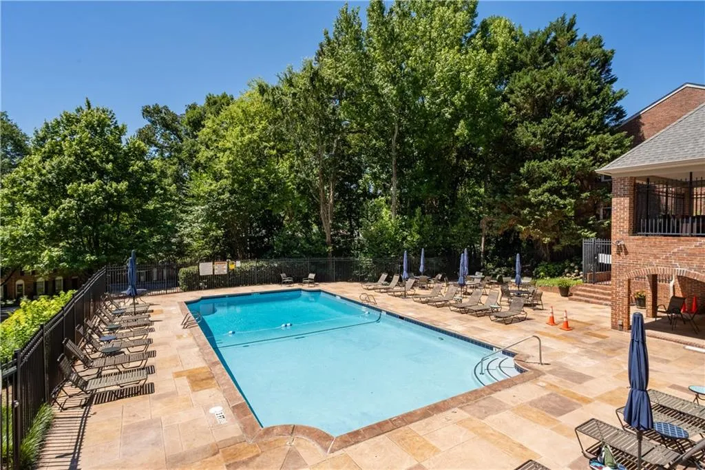 View of swimming pool with a patio area
