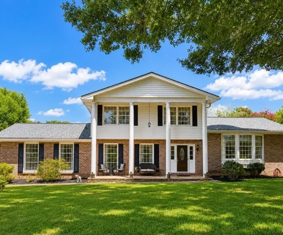 43 Ridgeview Drive SE - 2,548 sq. ft. on 0.64 acres with a new roof installed in 2025.