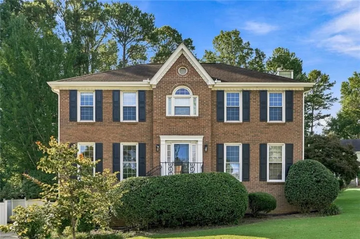 Brick exterior with a gabled roofline