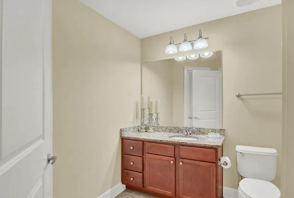 Bathroom featuring toilet and vanity