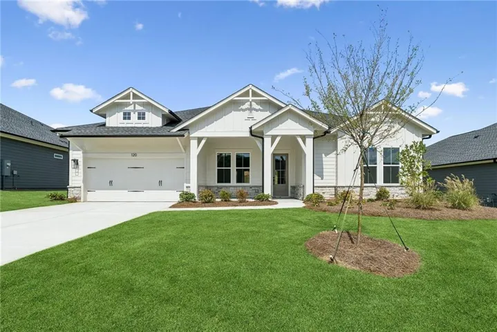 White siding exterior with black trim accents