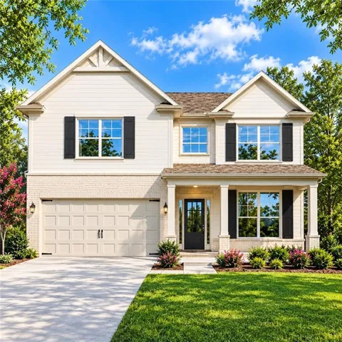 Two-story residence featuring light-colored brick and siding, a covered entry porch with columns, a two-car garage, and multiple windows with black shutters