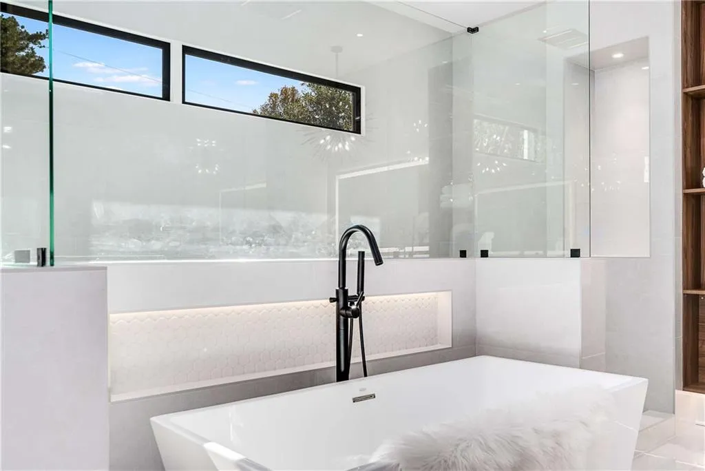Full bath featuring a freestanding tub