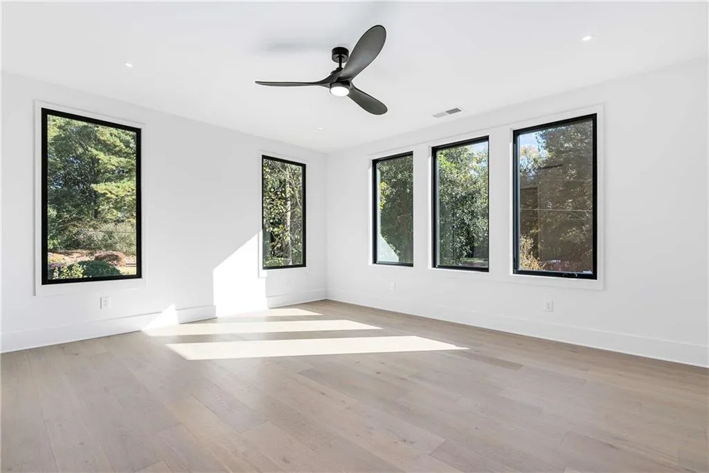 Unfurnished room featuring light wood finished floors, recessed lighting, and ceiling fan
