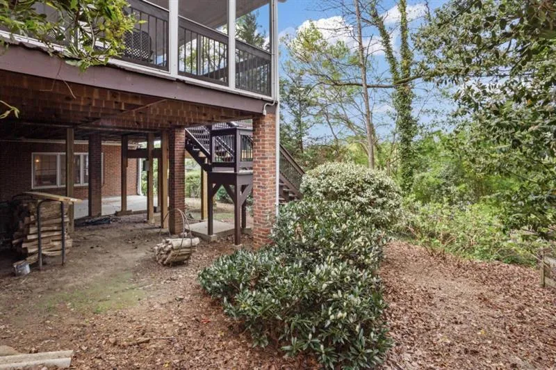 This portion of the backyard is fully fenced.