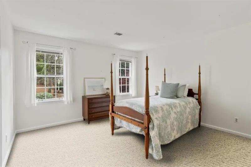 This photo shows a new, neutral carpet replacement.