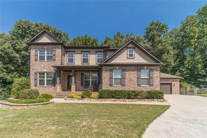 Rare 4 Car Garage with Stunning Brick Exterior!