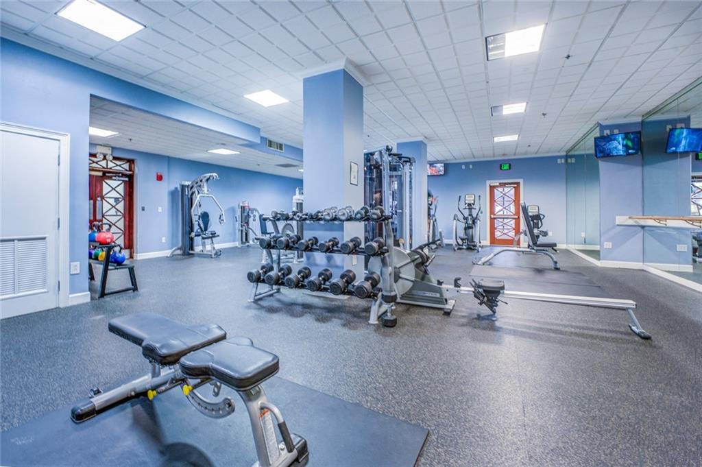 Workout area featuring a paneled ceiling