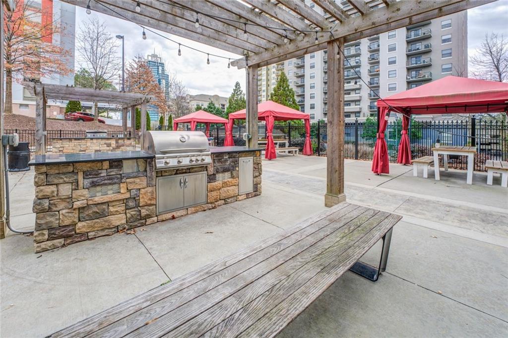 View of patio / terrace featuring area for grilling, a gazebo, and a pergola
