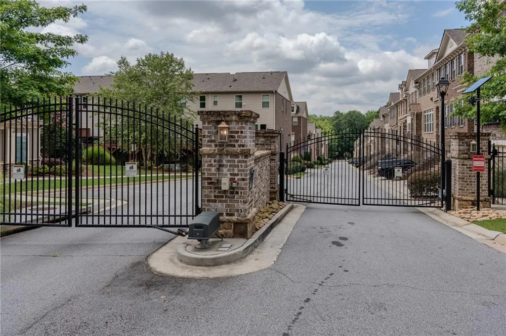 Gate with a residential view