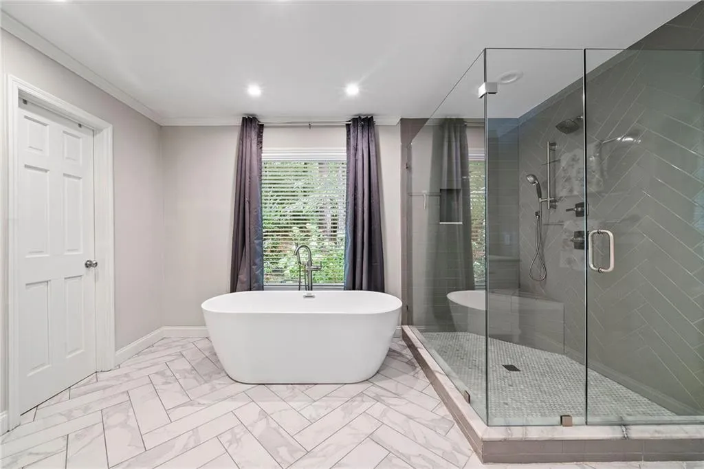 Primary Bath on main with soaking tub and walk in shower