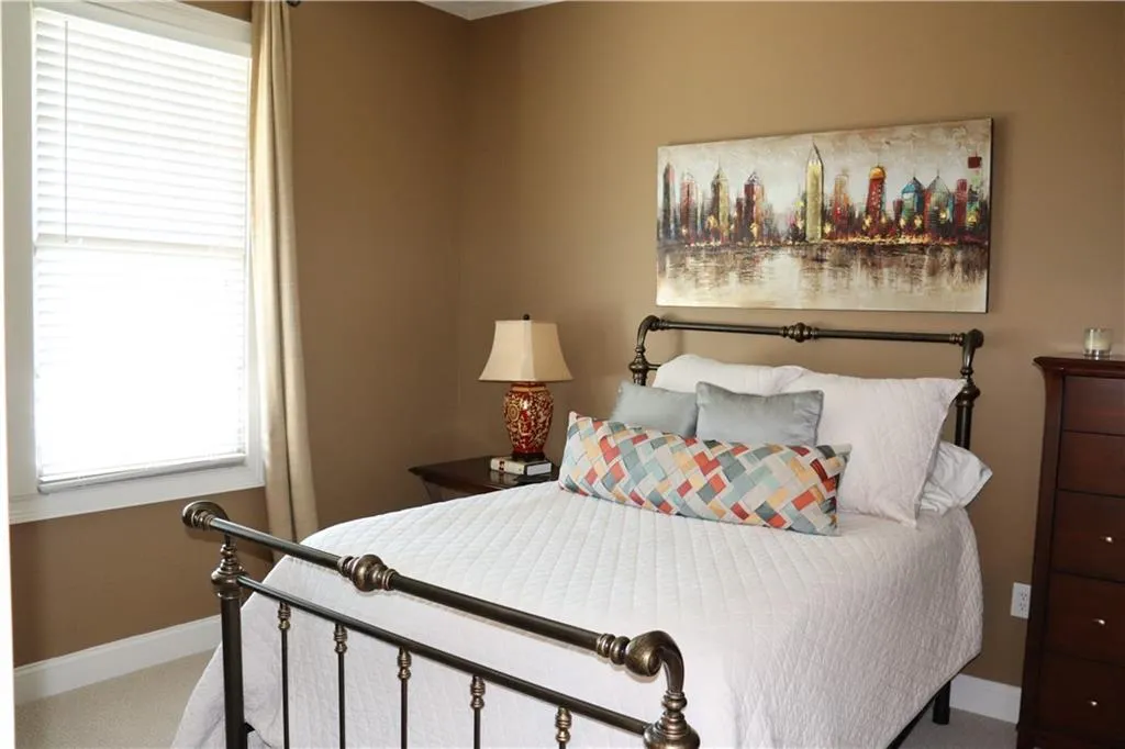 Second bedroom with ensuite bath and linen closet