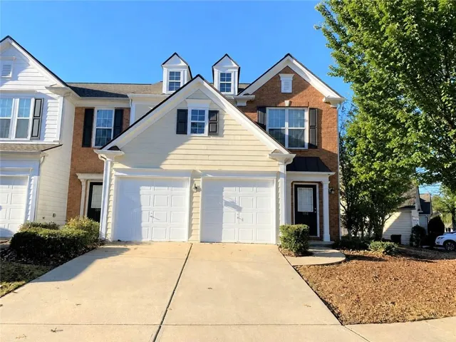 Brick and siding exterior with gabled roof lines