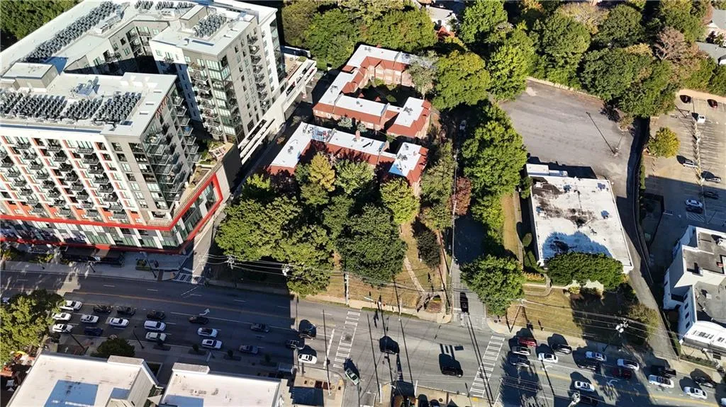 Aerial overview of property's location featuring apartment complex