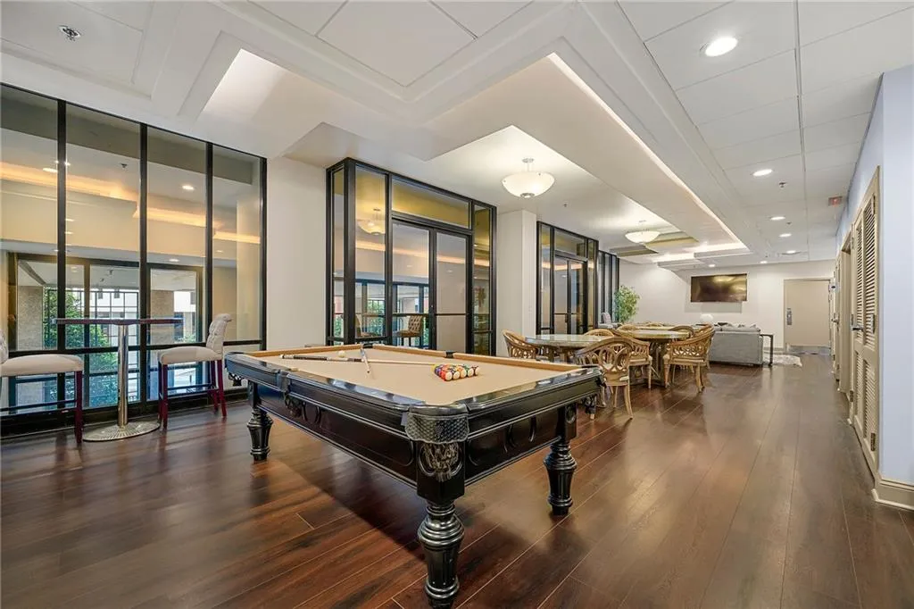 Rec room featuring dark wood-style floors and pool table