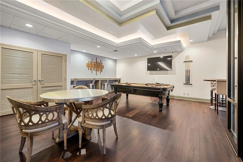 Game room featuring pool table, wood-type flooring, and recessed lighting