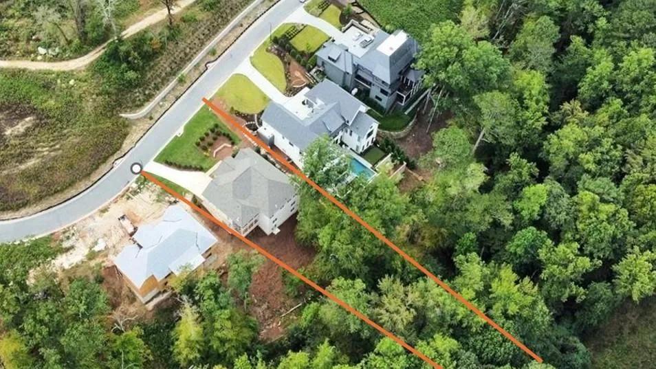 Red lines are approximate lot size.  Lot is very long, past creek