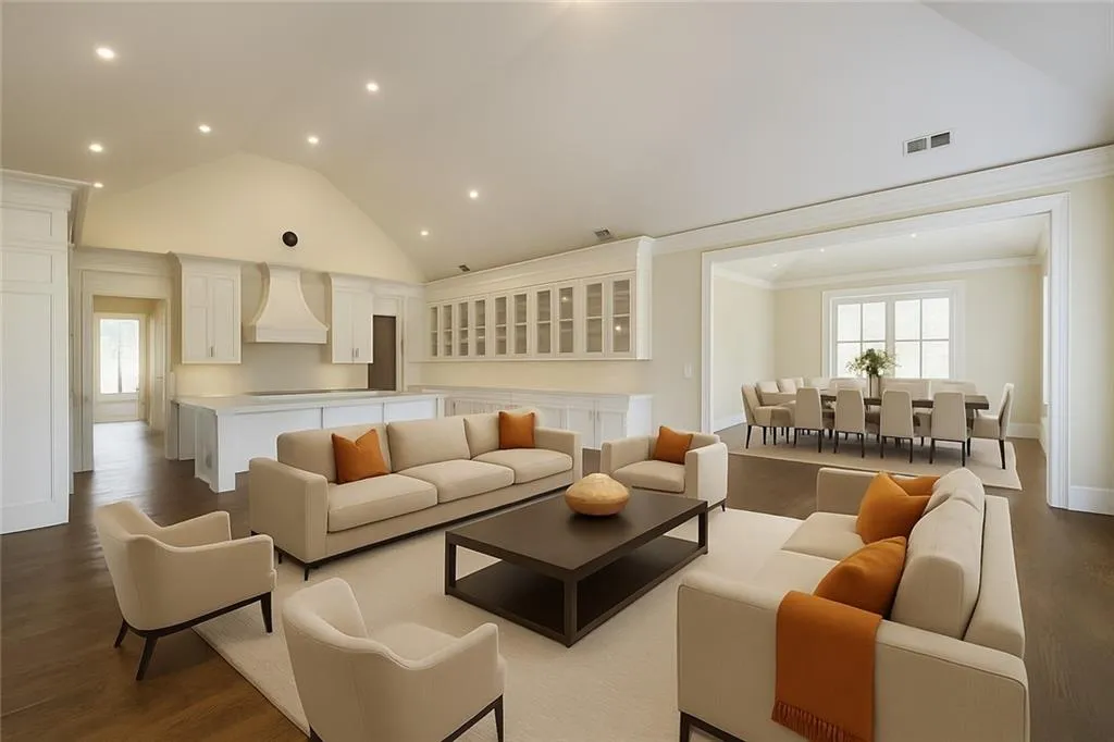 Virtually Staged large open concept living room with sunlight windows overlooking park like setting.  Open to adjacent room large enough for 12 seat dining and sitting.  Deck attached with views.