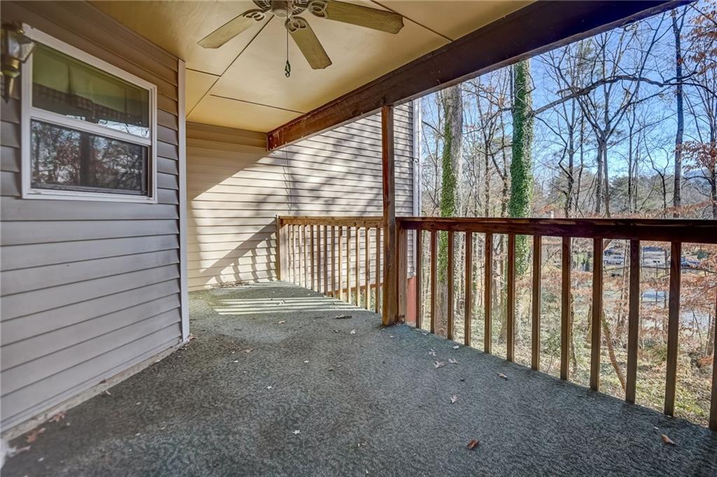 Wooden terrace with ceiling fan