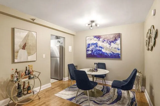 Dining space featuring wood finished floors