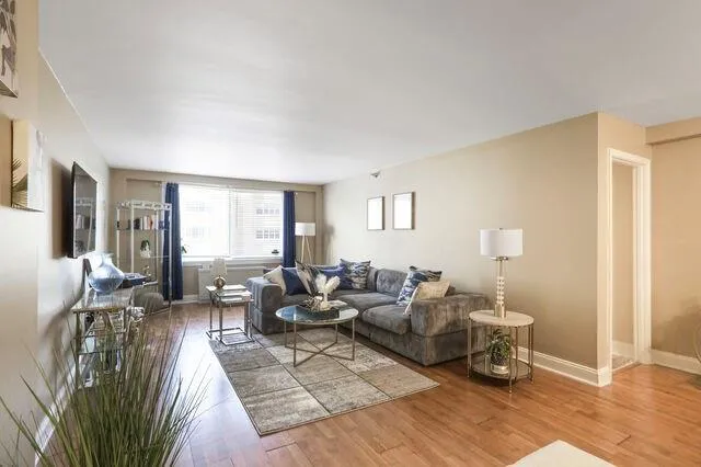 Living room featuring wood finished floors