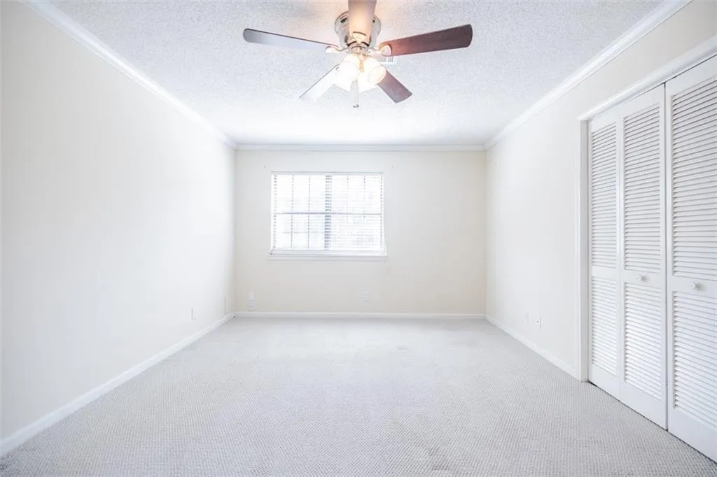 The primary bedroom faces east and gets plenty of natural light.