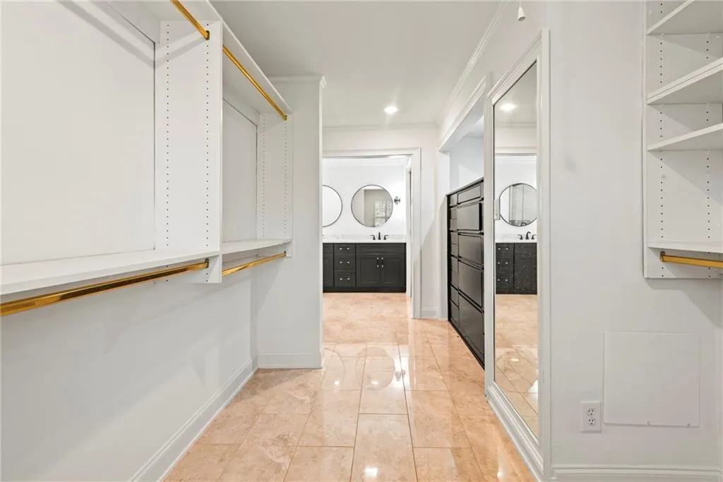 Walk in closet featuring sink