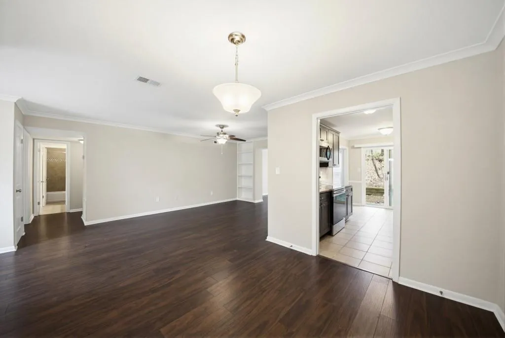 The living room, dining room, and sunroom flow seamlessly together